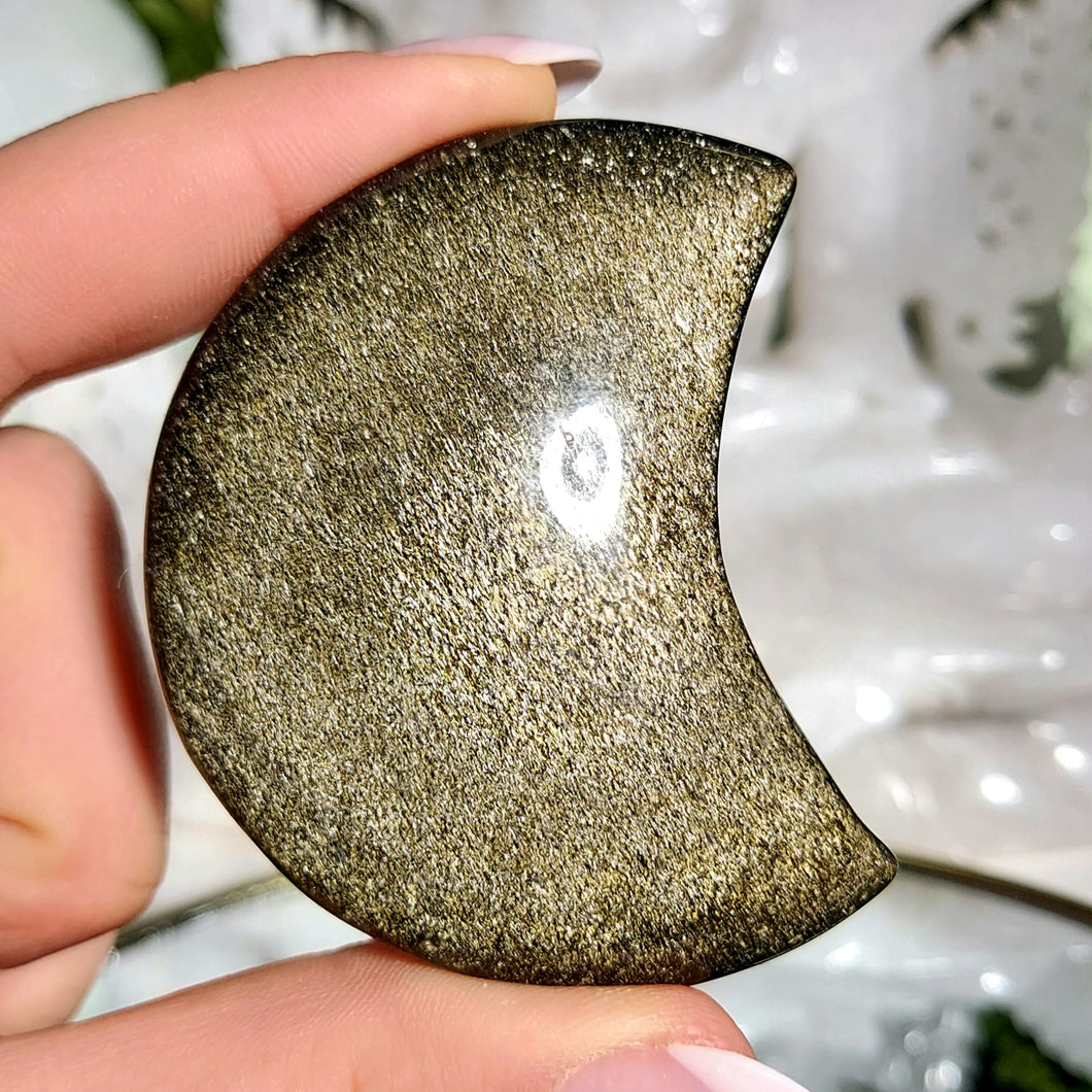 Obsidian Mond mit goldenem Flash