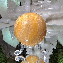 Lade das Bild in den Galerie-Viewer, Orangencalcit Kugel mit Stand
