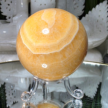 Lade das Bild in den Galerie-Viewer, Orangencalcit Kugel mit Stand
