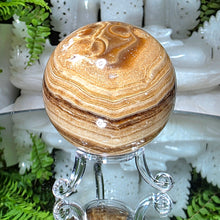 Lade das Bild in den Galerie-Viewer, Schokoladencalcit Kugel mit Stand
