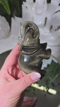 Laden und Abspielen von Videos im Galerie-Viewer, Obsidian Elefanten Carving mit goldenem Flash
