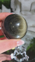 Laden und Abspielen von Videos im Galerie-Viewer, Obsidian Kugel mit Goldflash mit Stand
