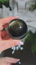 Laden und Abspielen von Videos im Galerie-Viewer, Obsidian Kugel mit Goldflash mit Stand
